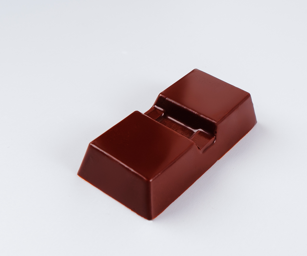 Molde de alta calidad para hacer tus propias mini barras de chocolate de 20 gramos.